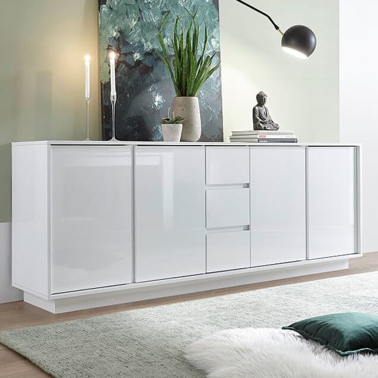 Read more about Iconic sideboard in white high gloss with 4 doors and 3 drawers