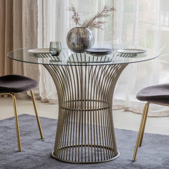Product photograph of Indio Clear Glass Dining Table With Bronze Metal Frame from Furniture in Fashion