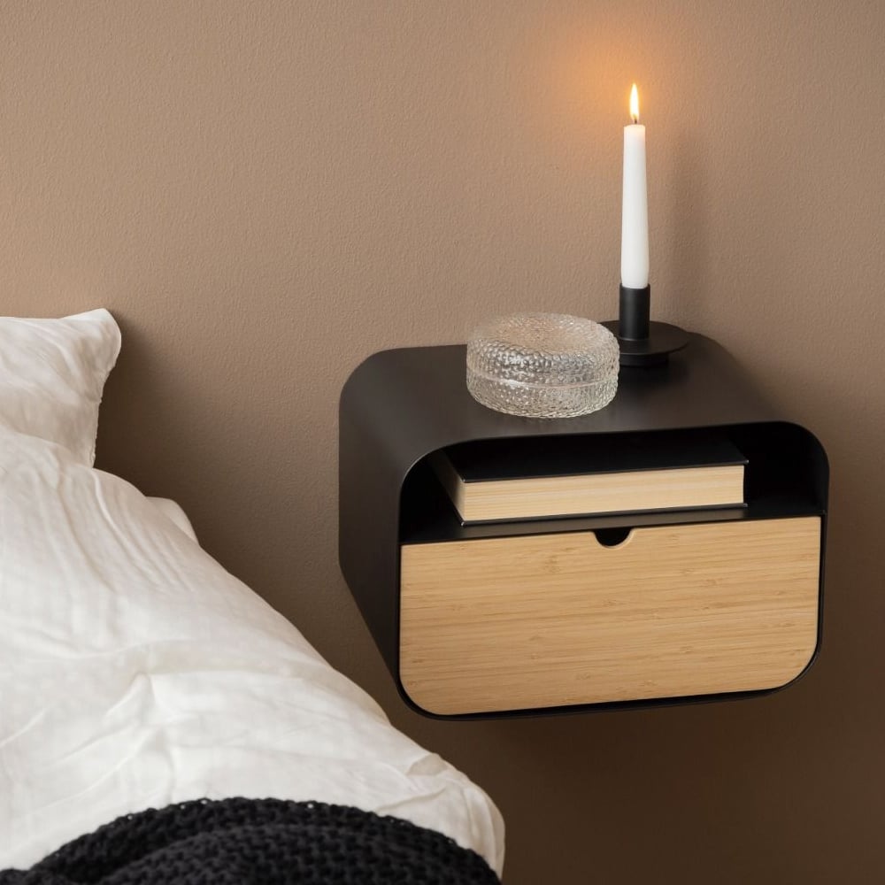 Read more about Indio wooden oval bedside cabinet with 1 drawer in black bamboo