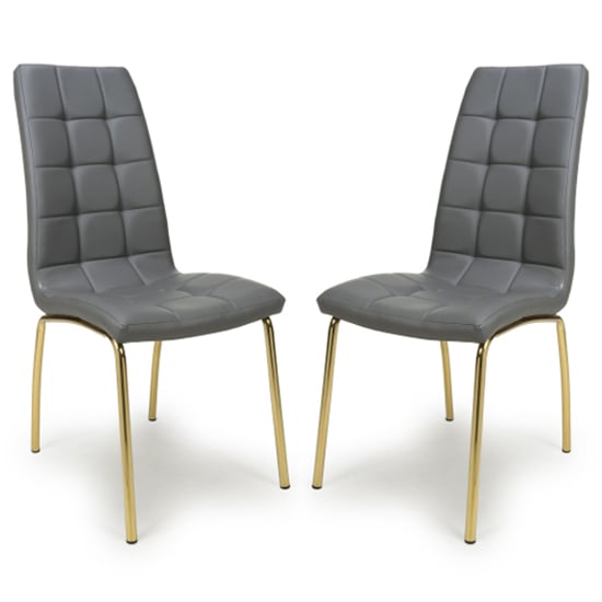 justin grey faux leather dining chairs with gold legs in pair