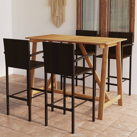 Photo of Kael outdoor wooden bar table with 4 brown poly rattan stools