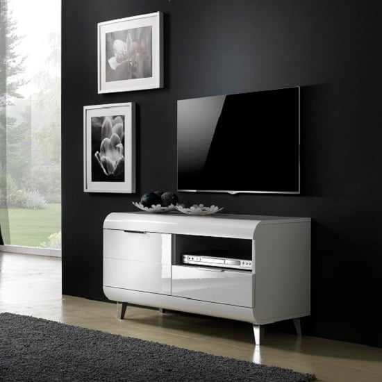 Read more about Kenia small tv stand in white high gloss with wooden legs