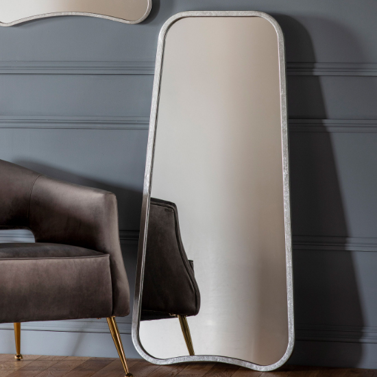 Read more about Koran large curved bedroom mirror in silver frame