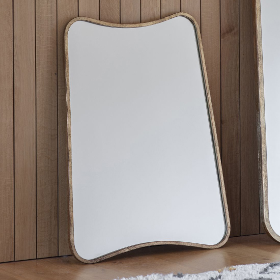 Read more about Koran small curved bedroom mirror in gold frame