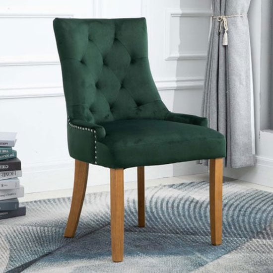 Read more about Lauren velvet dining chair in dark green with oak legs