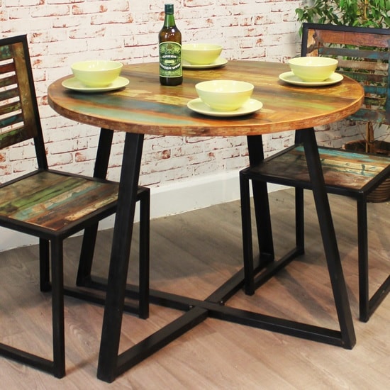 Read more about London urban chic wooden round dining table with steel base