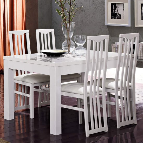 Photo of Lorenz dining table in gloss white with 6 white cexa chairs
