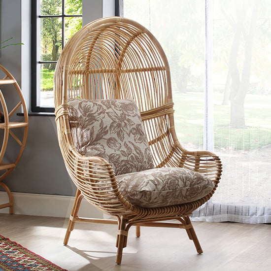 Read more about Loum rattan armchair with foral beige seat cushion