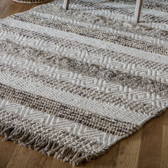 Read more about Ludina rectangular fabric rug in ivory