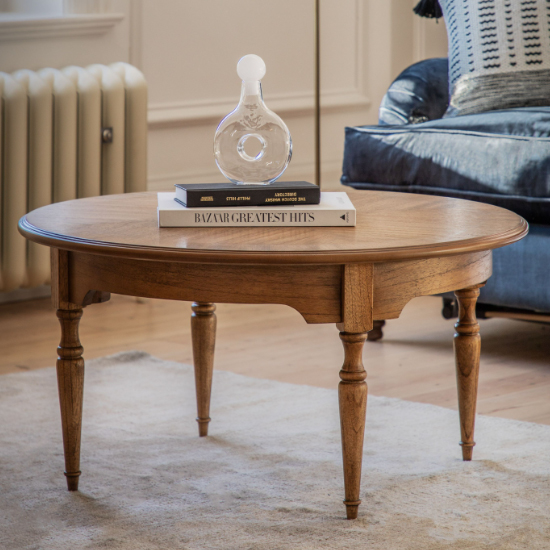 Read more about Madisen round wooden coffee table in peroba