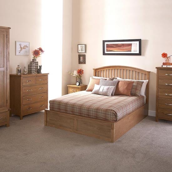 Photo of Millom ottoman wooden king size bed in natural oak