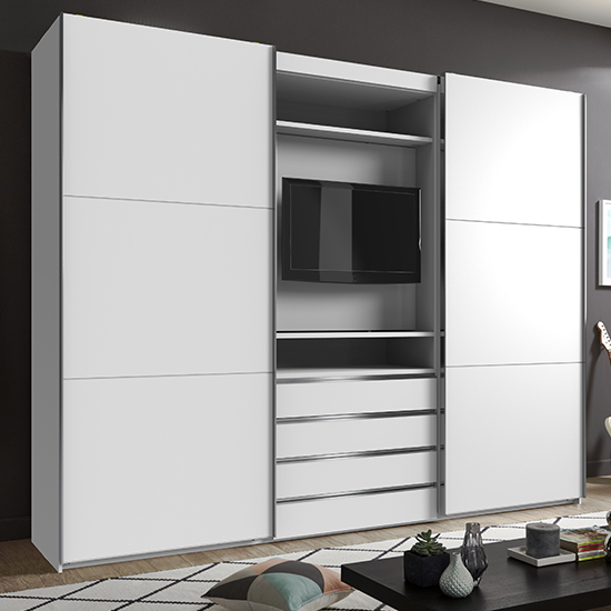 Read more about Magic wooden sliding door wide wardrobe in white with tv shelf