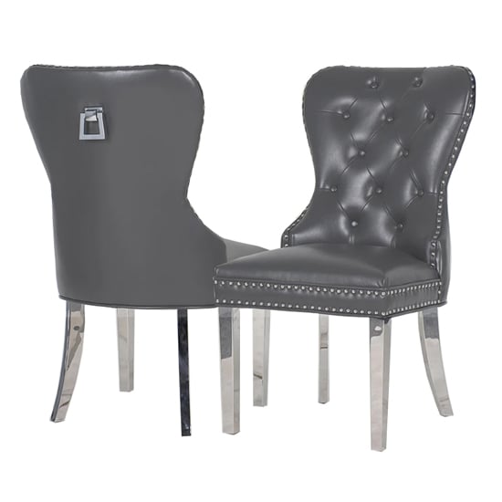Photo of Marina dark grey faux leather dining chairs in pair