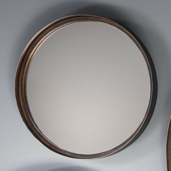 Photo of Marion medium round wall bedroom mirror in bronze frame