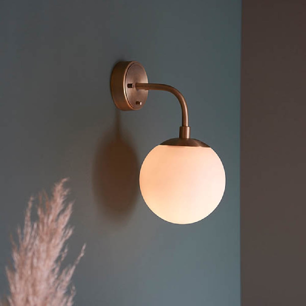 Product photograph of Mayetta Opal Glass Shade Wall Light In Matt Antique Brass from Furniture in Fashion