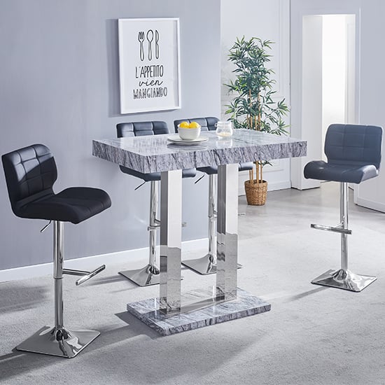 Photo of Melange marble effect bar table with 4 candid black stools