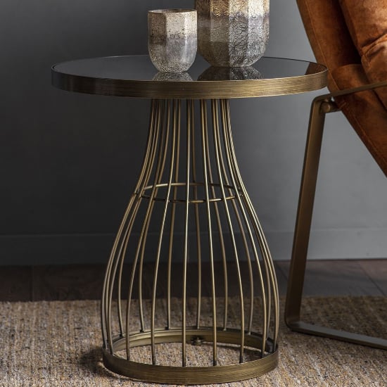 Read more about Minnesota round black glass side table with bronze frame