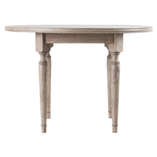 Photo of Mestiza round wooden dining table in natural