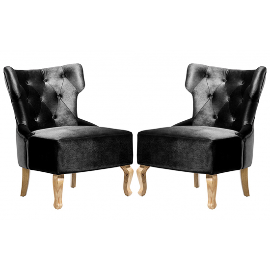 Photo of Narvel black velvet dining chairs with wooden legs in pair