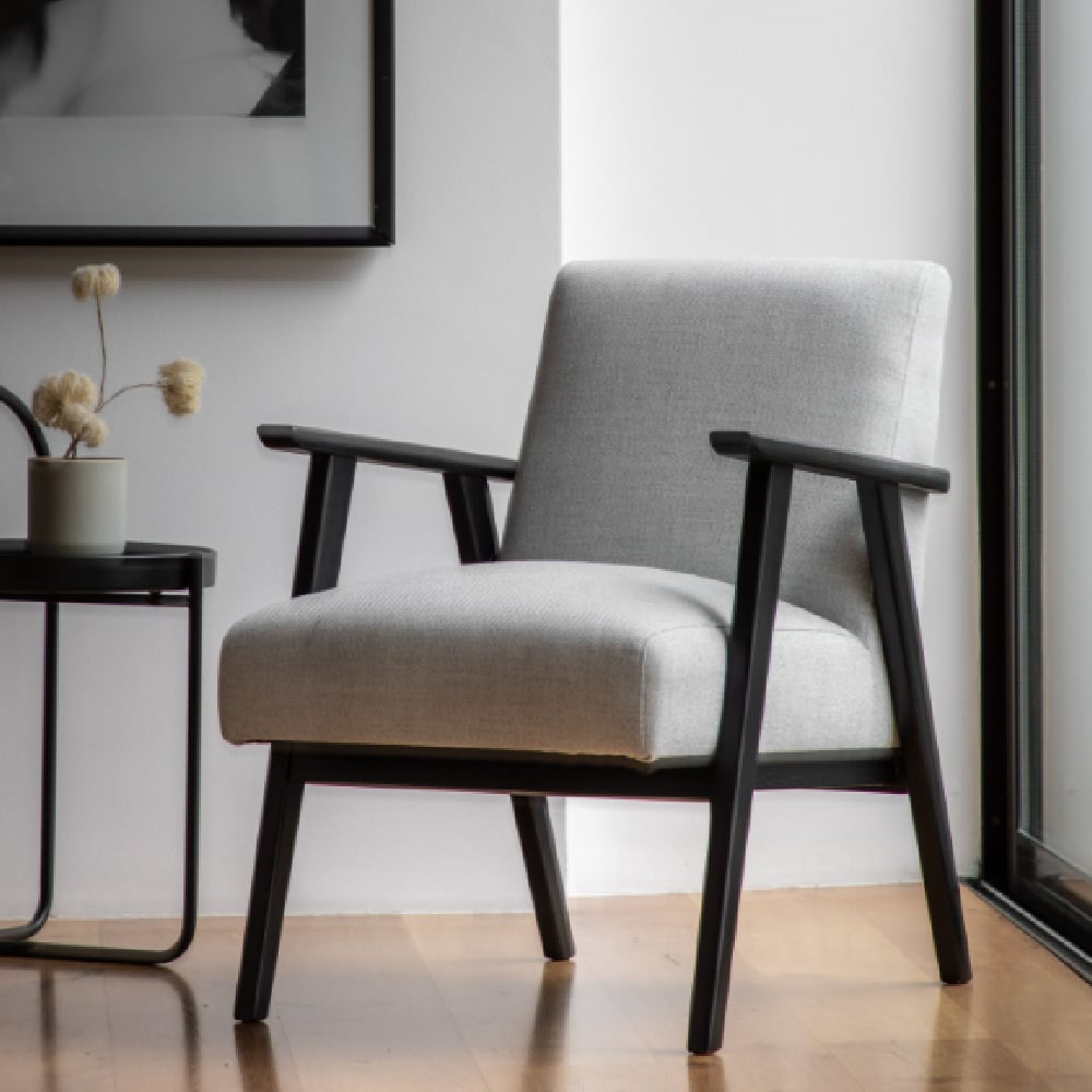 neelan fibre armchair with wooden legs in stone