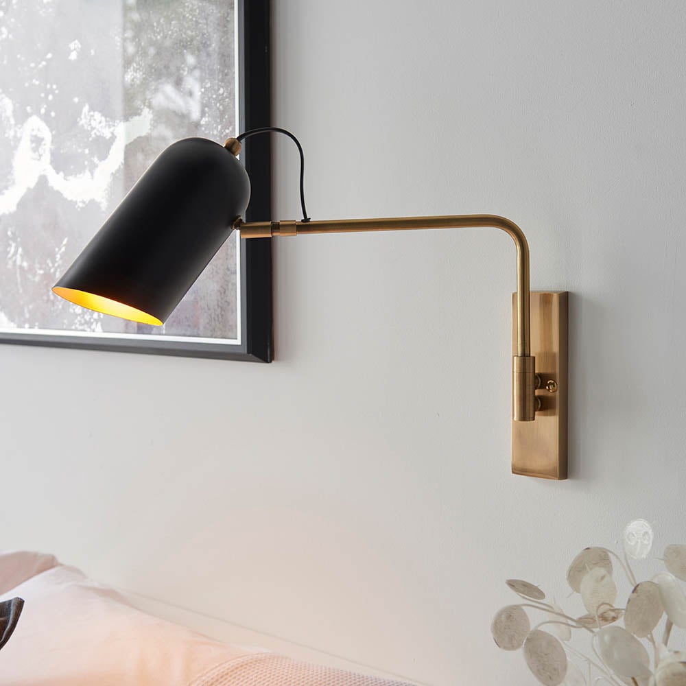 Product photograph of Newkirk Matt Black Shade Metal Wall Light In Antique Brass from Furniture in Fashion