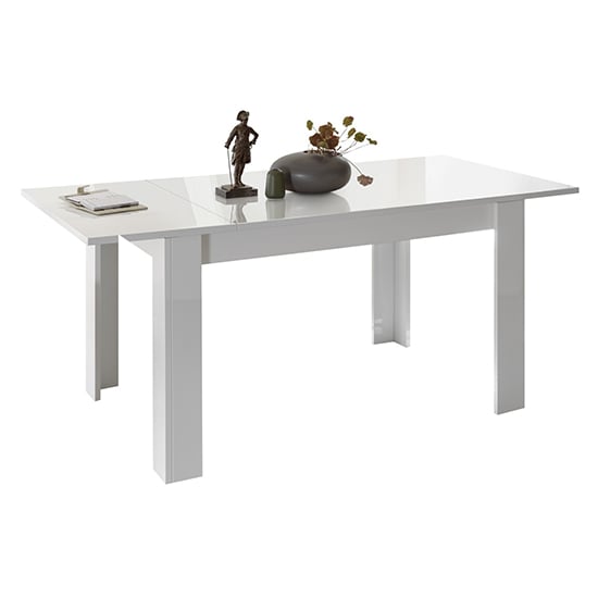 Read more about Nitro extending wooden dining table in white high gloss