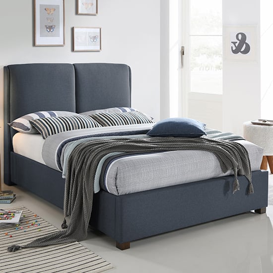 Photo of Oakland fabric king size bed in dark grey with dark oak legs