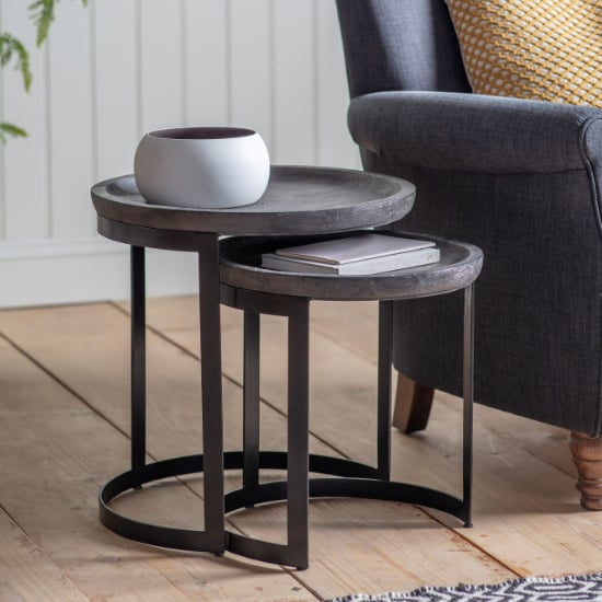 Photo of Ortica round wooden nest of 2 tables in grey wash