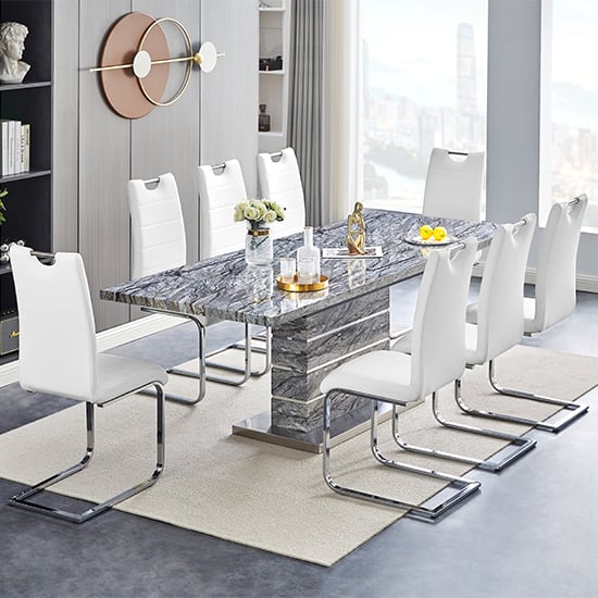 Photo of Parini extendable melange high gloss dining table 8 white chairs