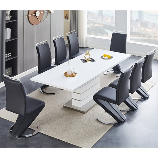 Photo of Parini extending white high gloss dining table 8 black chairs
