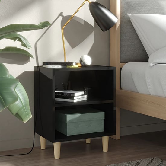 Read more about Pilis high gloss bedside cabinet in black with natural legs