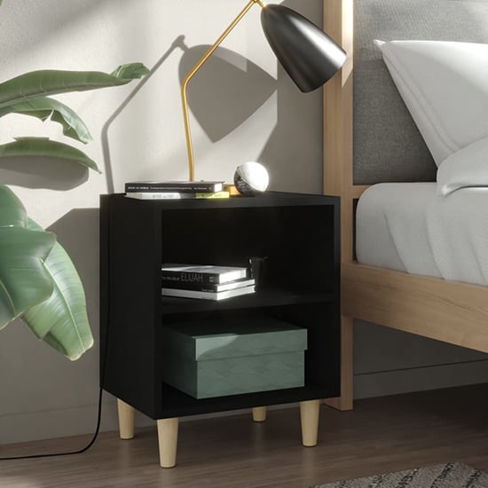 Read more about Pilis wooden bedside cabinet in black with natural legs