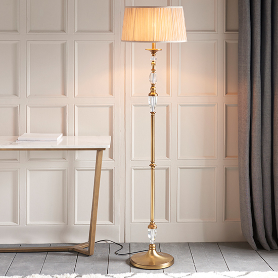 Photo of Polina floor lamp in antique brass with beige shade