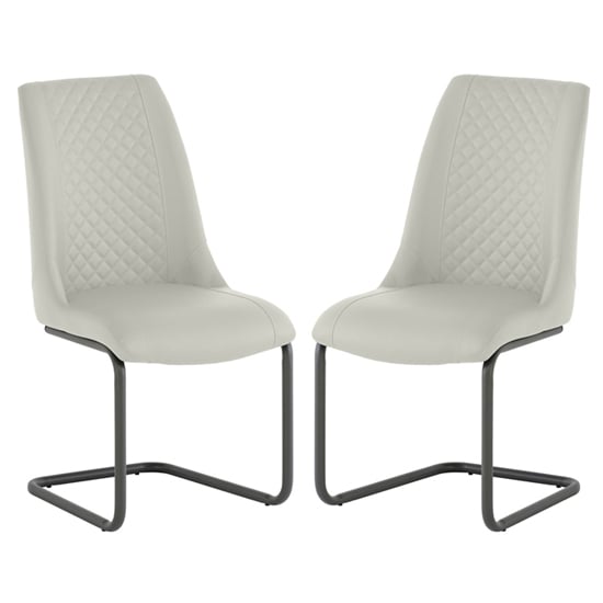 Photo of Revila stone faux leather dining chairs in pair