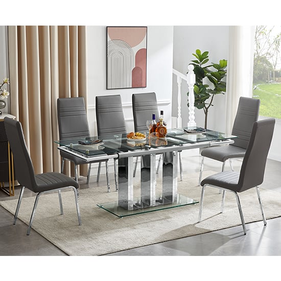 Photo of Rihanna extending clear dining table with 6 dora grey chairs