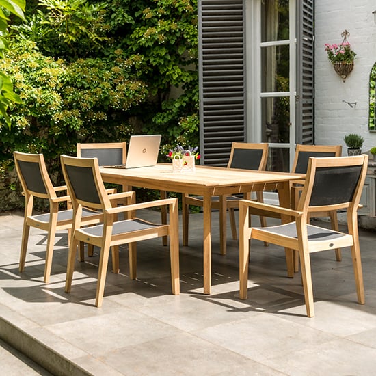 Photo of Robalt extending dining table with 6 armchairs in natural