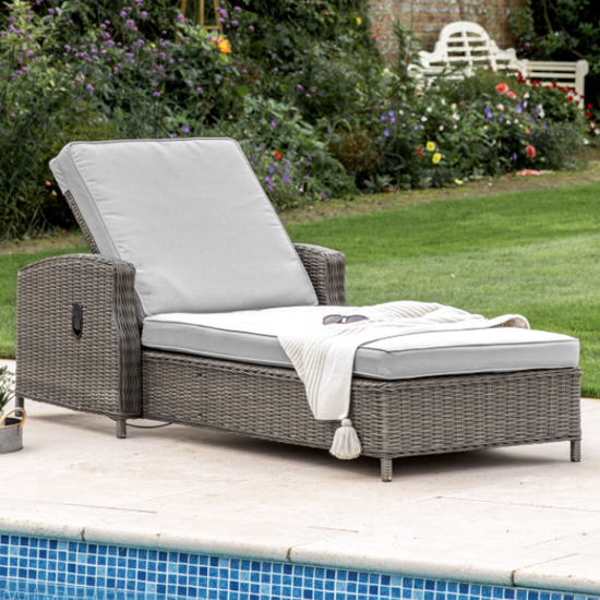 rattan effect lounger with cushion