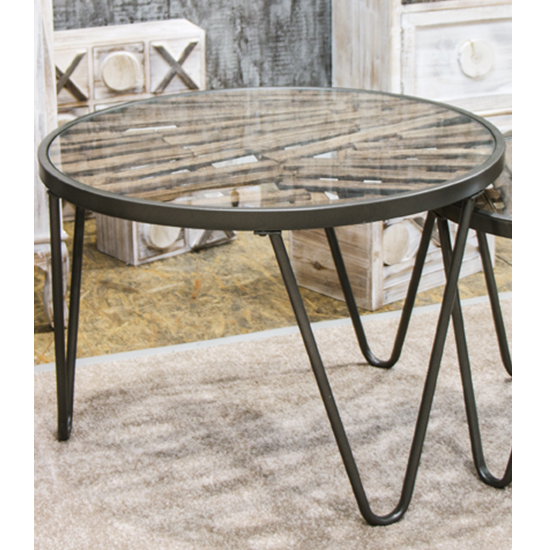Photo of Simons round clear glass side table with anthracite metal legs