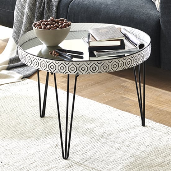 Read more about Sioux round mirrored coffee table in white with black legs