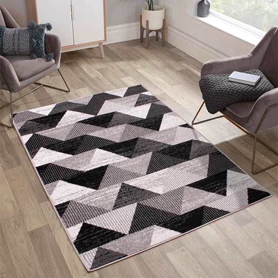 Photo of Spirit 60x110cm triangle design rug in black
