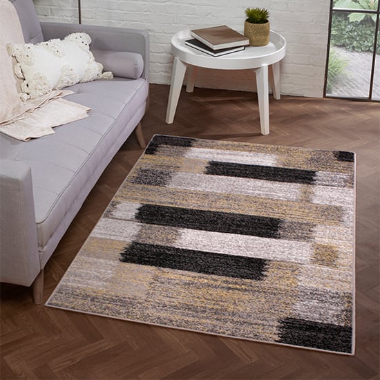 Photo of Spirit 66x230cm mosaic design rug in grey and gold