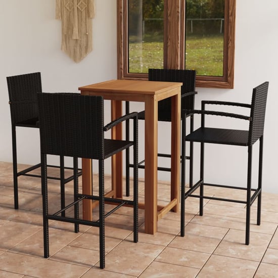 Photo of Starla small natural wooden bar table with 4 black bar chairs