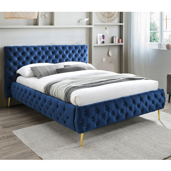 Photo of Tiffar velvet upholstered king size bed in blue