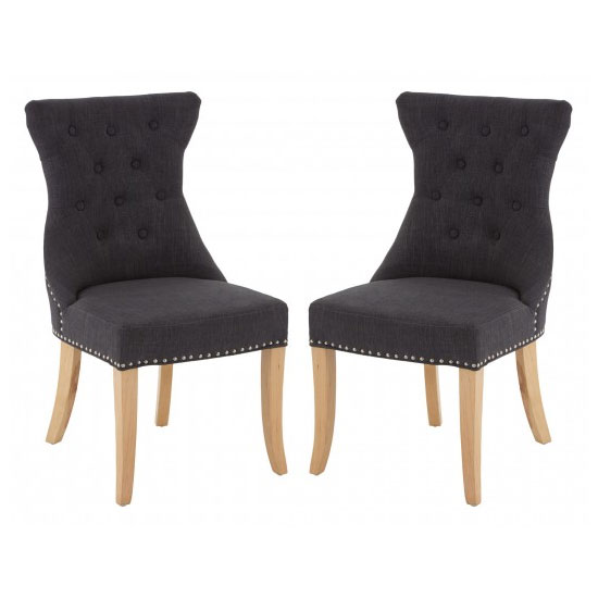 Photo of Trento upholstered dark grey fabric dining chairs in a pair