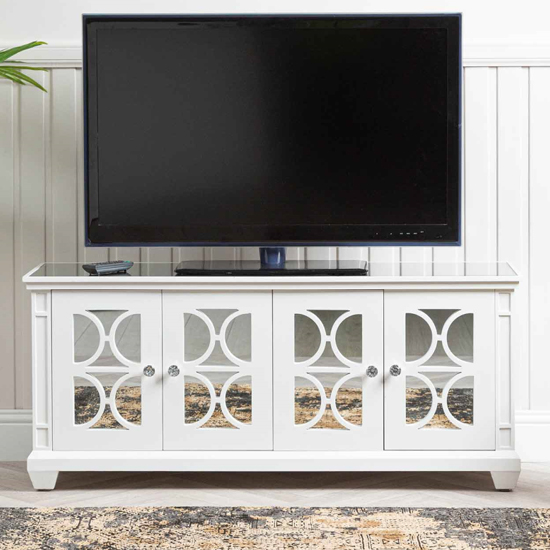 Photo of Tyler mirrored tv stand with 4 doors in washed white
