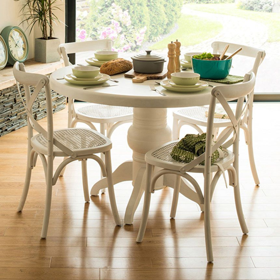 Photo of Varmora wooden dining table with 4 chairs in white wash