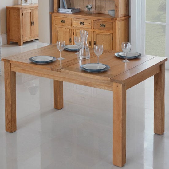 Read more about Velum wooden extending dining table in chunky solid oak