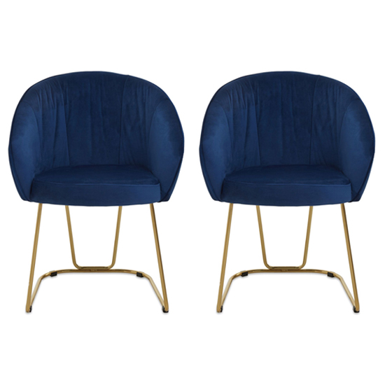 Photo of Vinita upholstered midnight blue velvet dining chairs in a pair