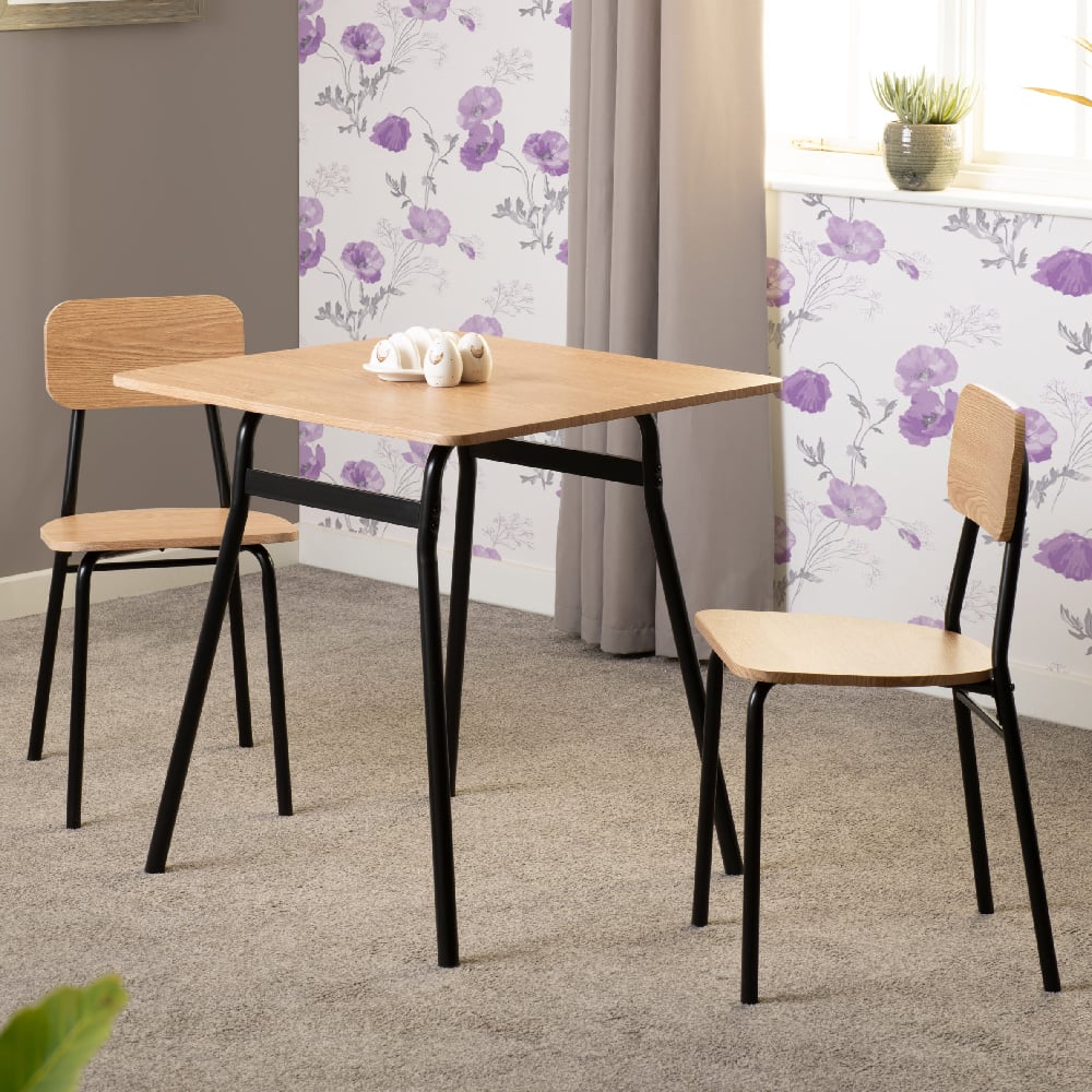 waldorf wooden dining table with 2 chairs in russet oak and black