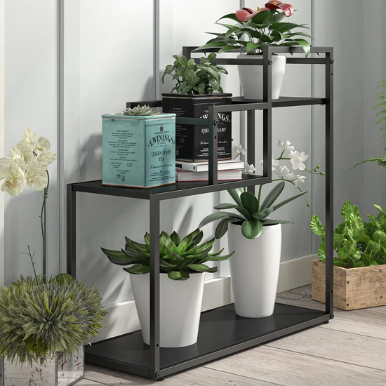 Photo of Warton wooden plant stand with metal frame in black